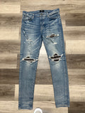 Amiri Mx1 jeans light blue/brown rips
