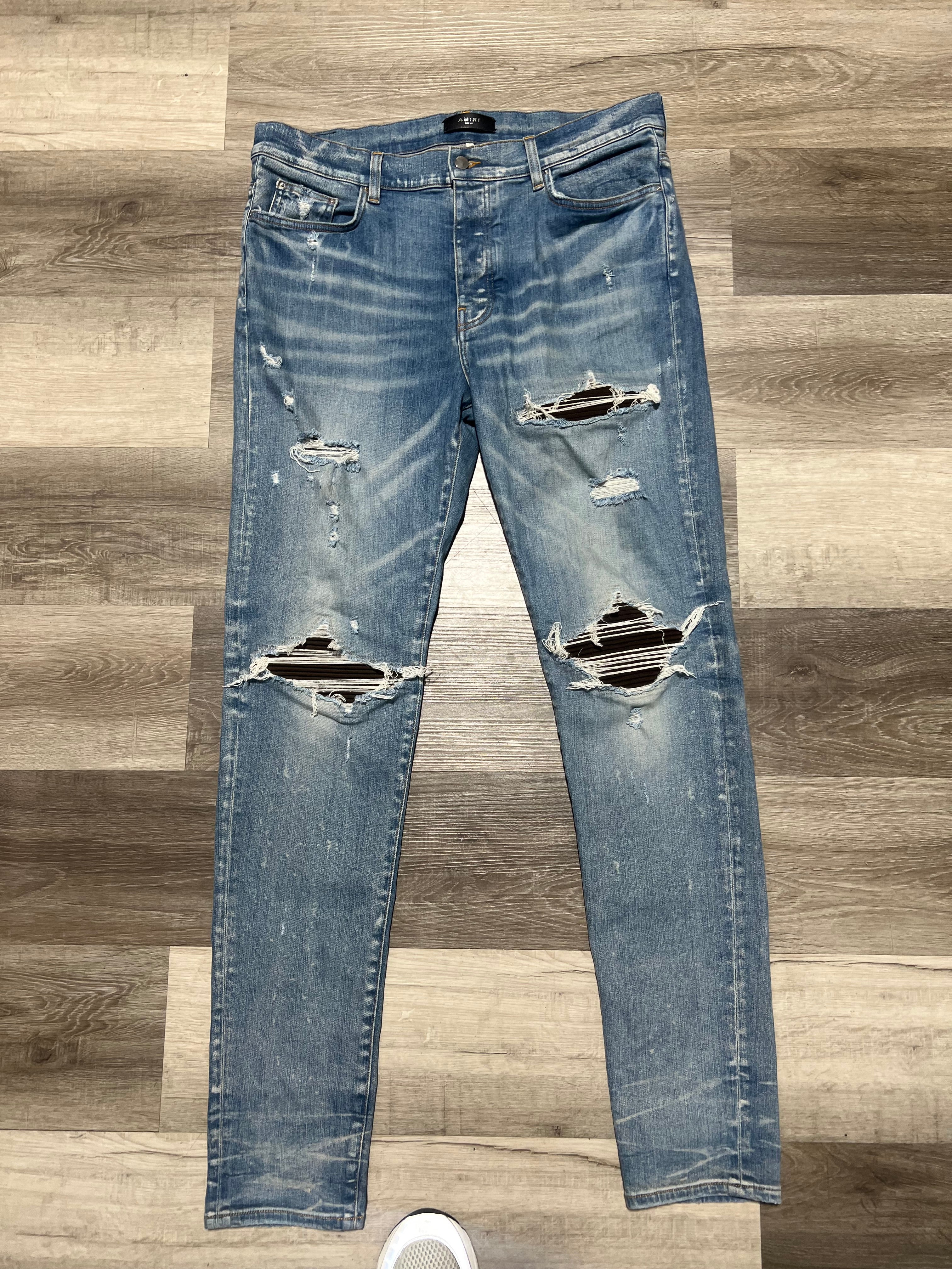 Amiri Mx1 jeans light blue/brown rips