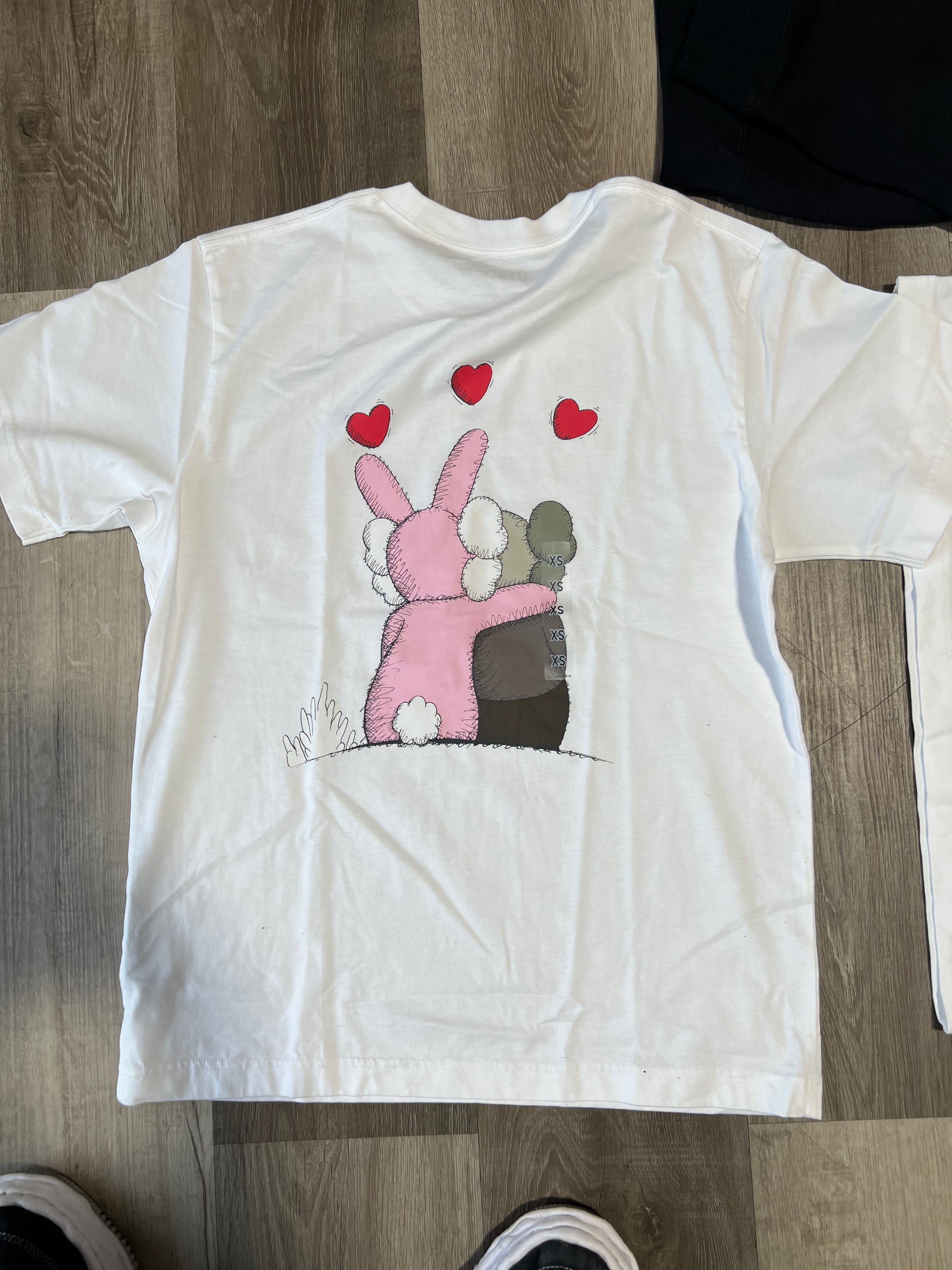 Uniqlo kaws tee couple white